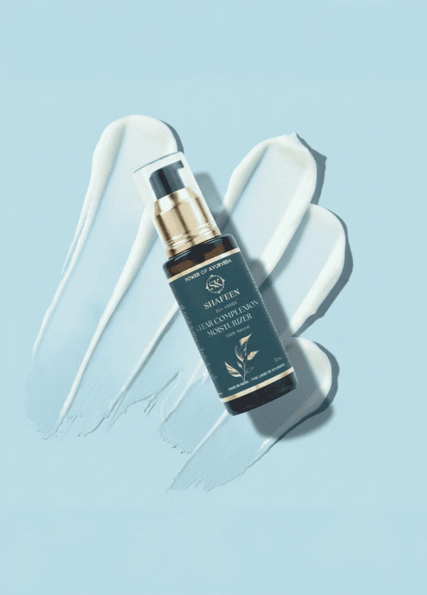 Skincare serum bottle with dropper on a light blue background