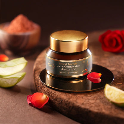 Clear Complexion Moisturizer on a dark surface with decorative elements.