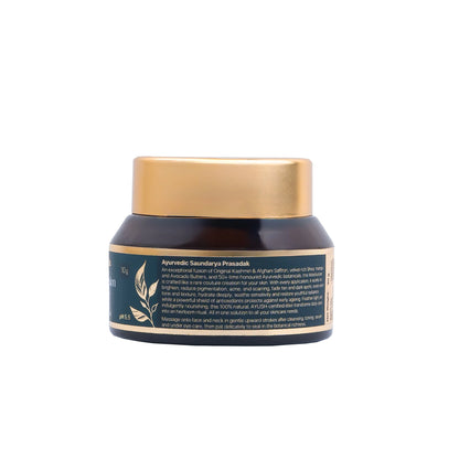Moisturizer jar with gold lid on a white background